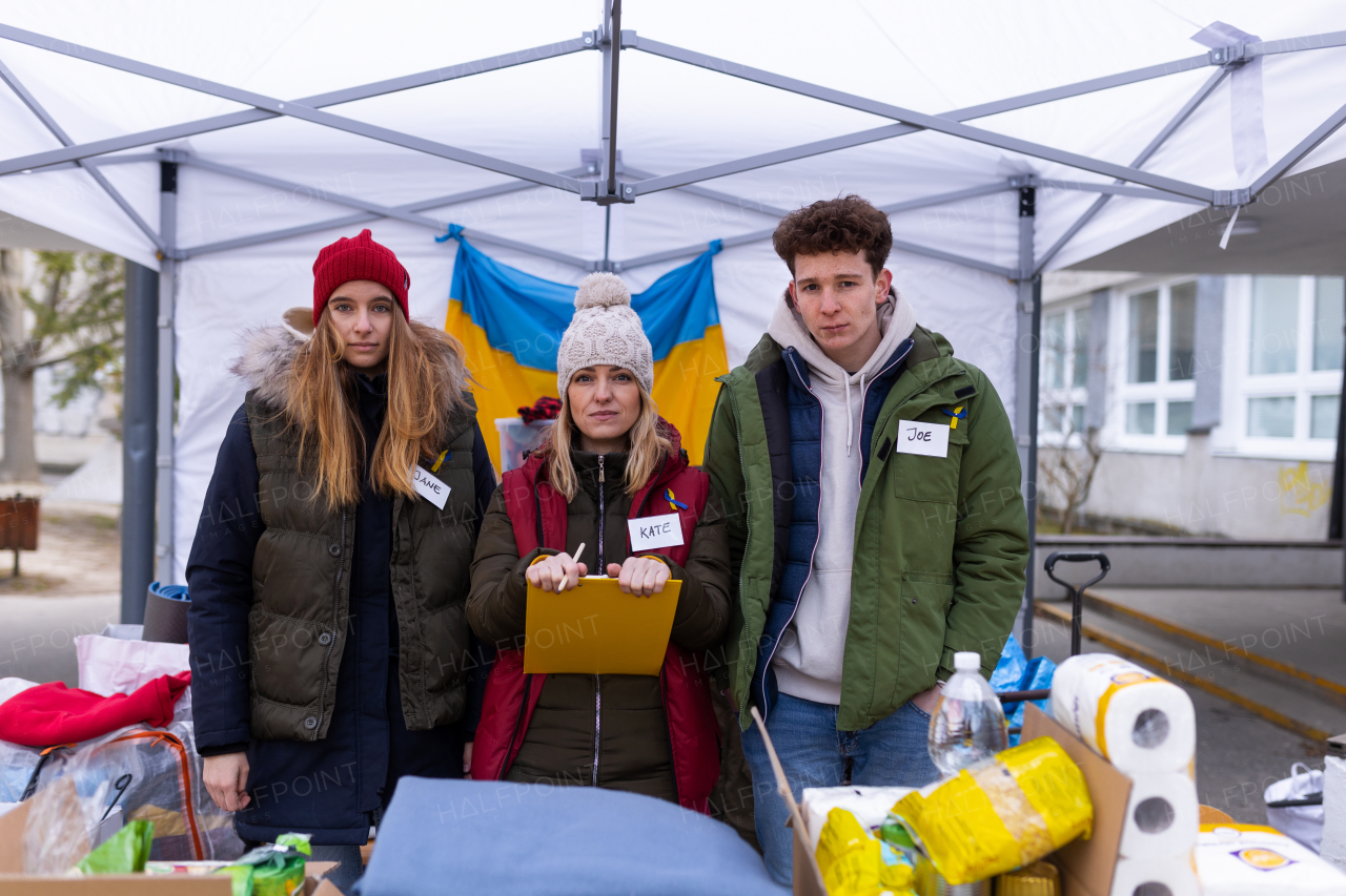 The team of volunteers distributing food, drinks and other donations to refugees on the Ukrainian border.