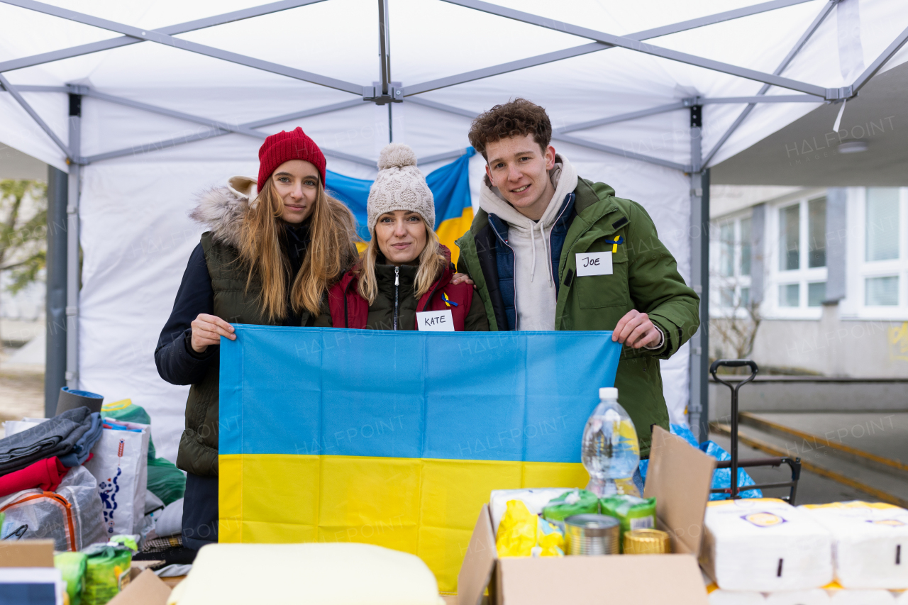 The team of volunteers distributing food, drinks and other donations to refugees on the Ukrainian border.