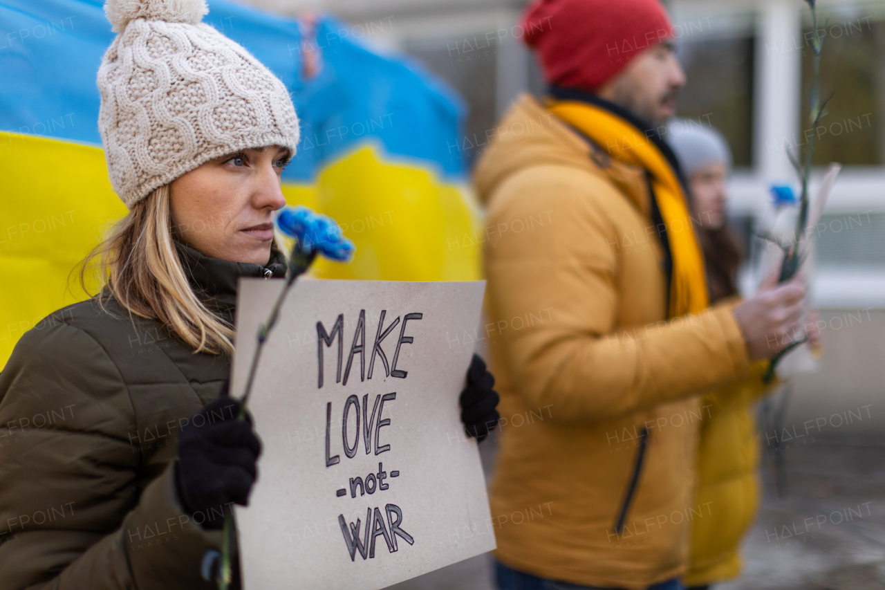 Protest against Russian invasion of Ukraine. People holding anti war sings and banners in the street.