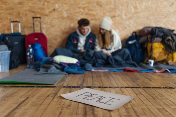 Ukrainian war refugees in a temporary shelter and help center.