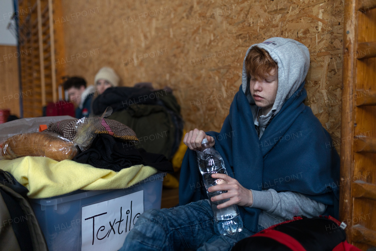 Ukrainian war refugees in a temporary shelter and help center.