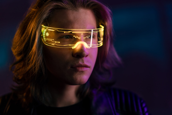 Metaverse digital cyber world technology, portrait of a young man with smart glasses, futuristic lifestyle