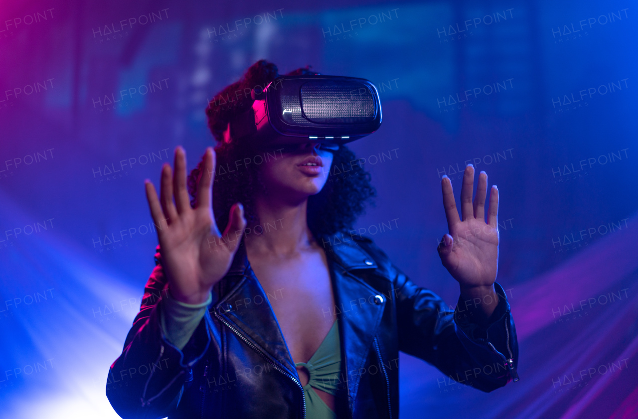 Metaverse digital cyber world technology, girl with virtual reality VR goggles playing augmented reality game, futuristic lifestyle