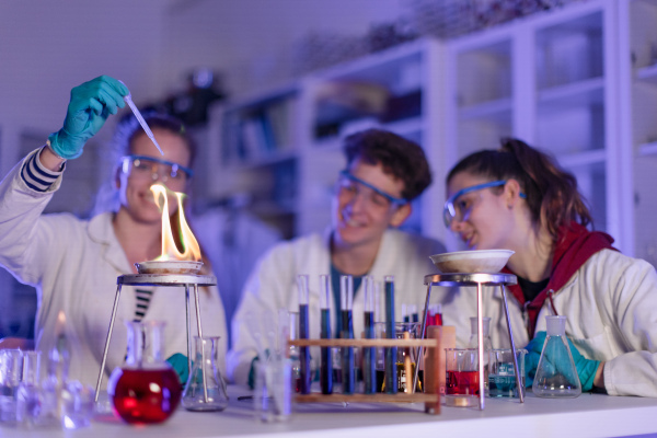 A science student doing chemical experiment in the laboratory at university.