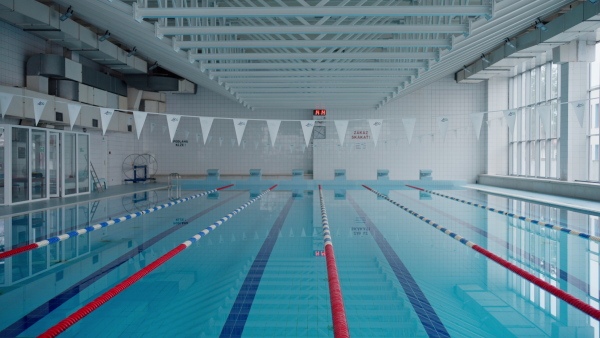 An interior of empty public swimming pool