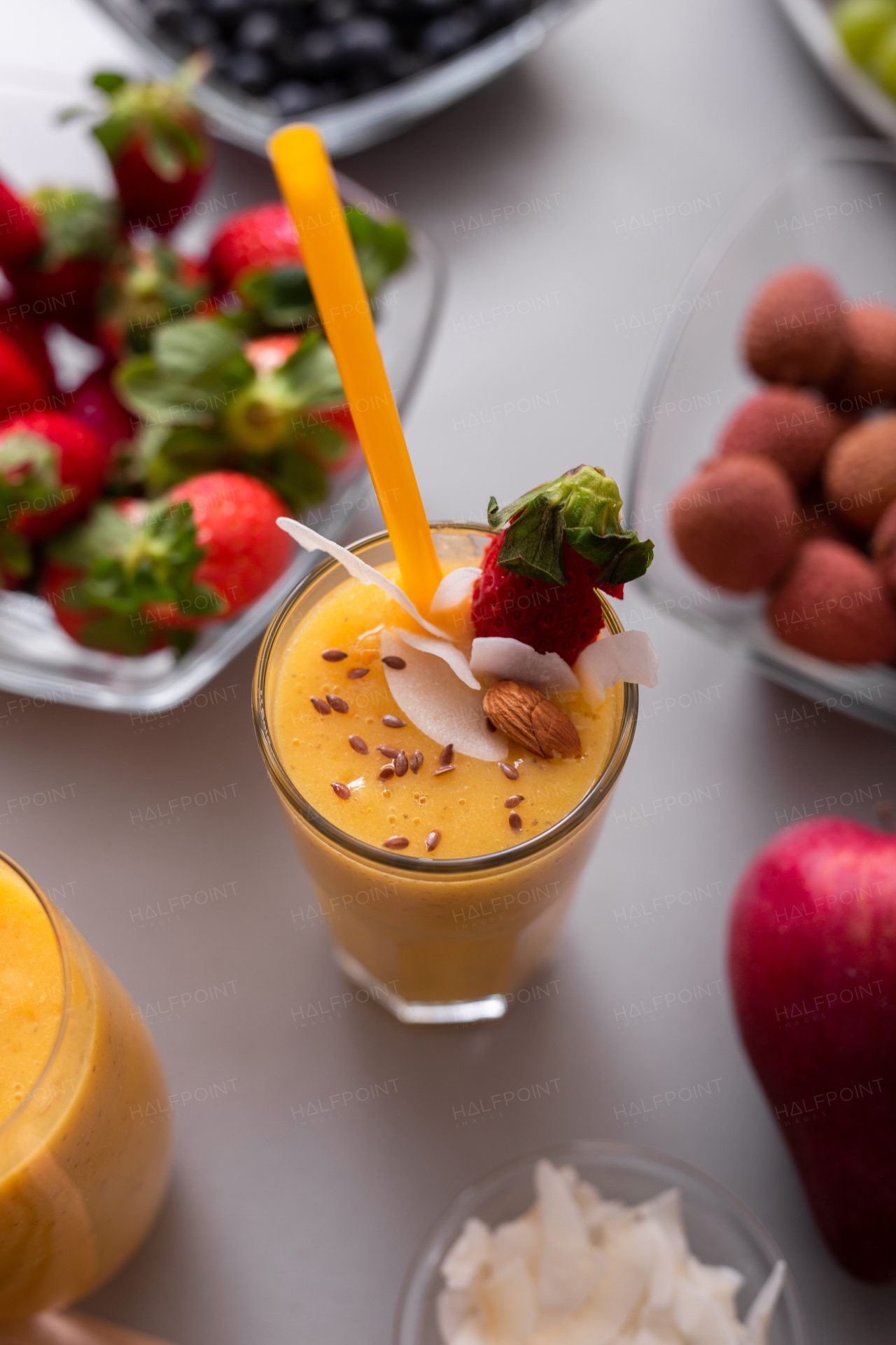 A fresh homemade fruit smoothie, healthy juicy vitamin drink diet or vegan food concept