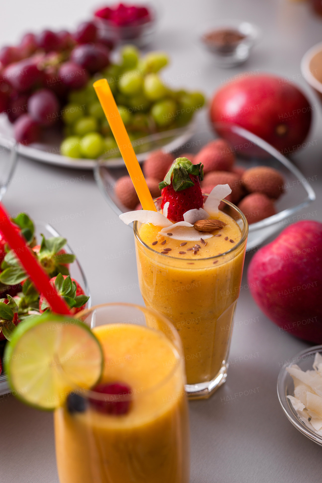 A fresh homemade fruit smoothie, healthy juicy vitamin drink diet or vegan food concept