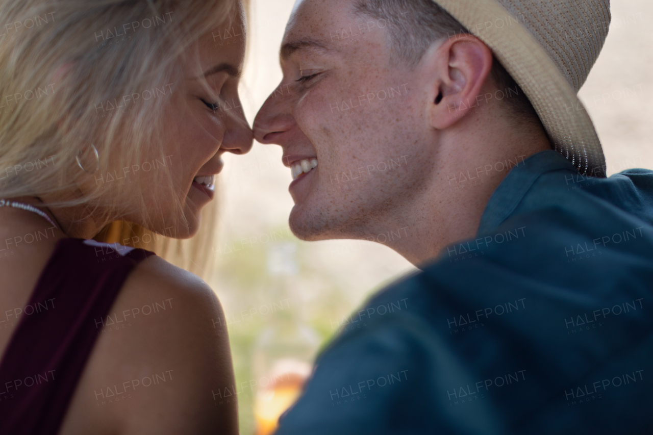 Portrait of a young couple in summer, bonding.