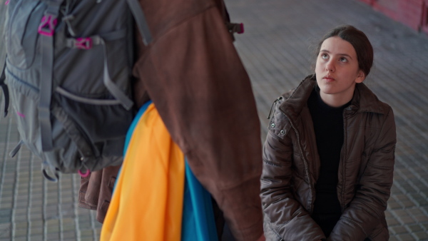 An Ukrainian refugee family in station waiting to leave Ukraine due to the Russian invasion of Ukraine.