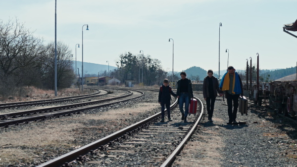 An Ukrainian refugee family in station waiting to leave Ukraine due to the Russian invasion of Ukraine.