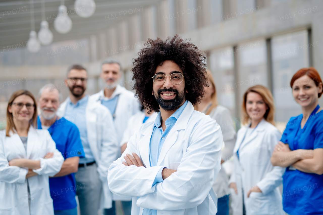 Portrait of team of doctors. Healthcare team with doctors, nurses, professionals in medical uniforms in hospital, modern clinic.