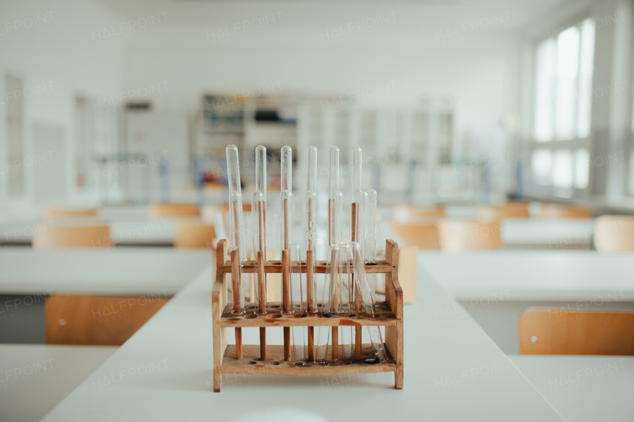 Laboratory test tube kit in wooden stand. Science or chemistry lab, classroom.