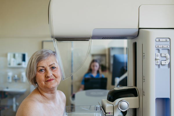 Older woman having yearly mammography for preventive healthcare