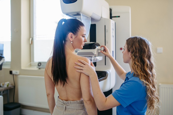 Female patient getting ready for mammography check
