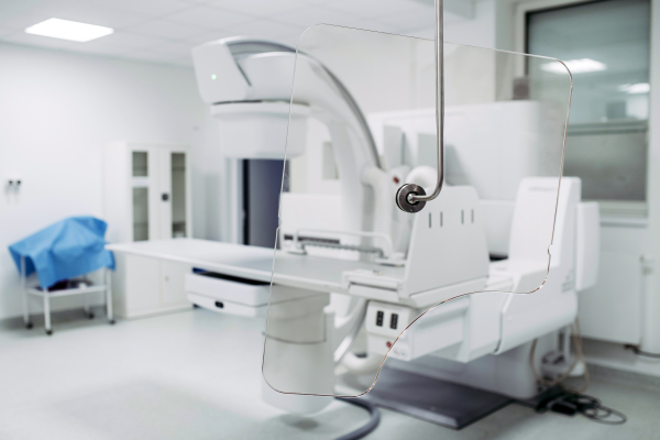 Modern tilting fluoroscopy wall unit in diagnostic imaging room