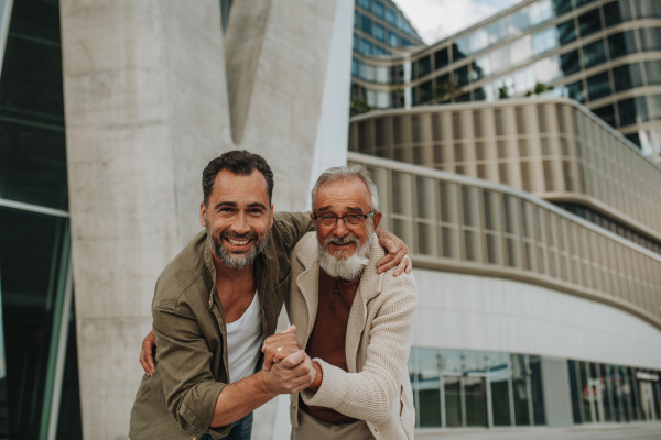 Portrait of handsome mature man and his older father Fathers day concept.