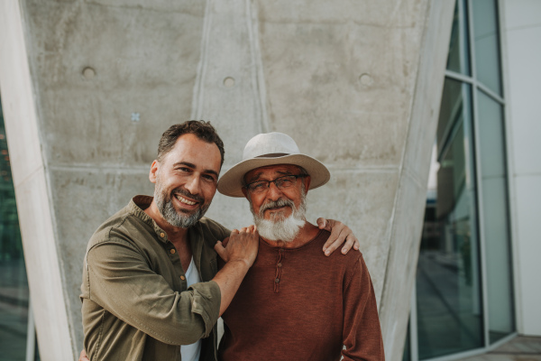 Portrait of handsome mature man and his older father Fathers day concept.