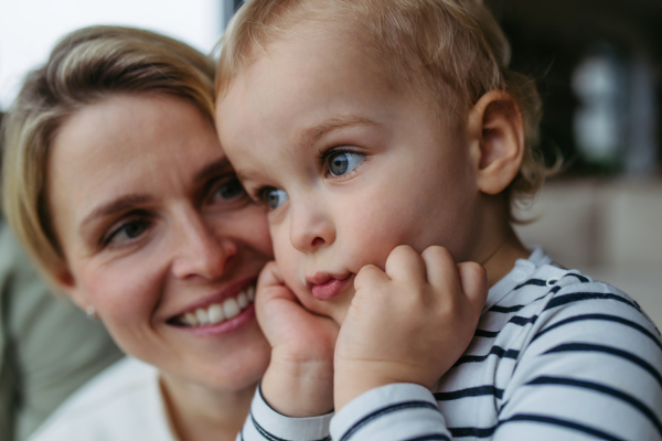 Beautiful mother spendig time with her little son,