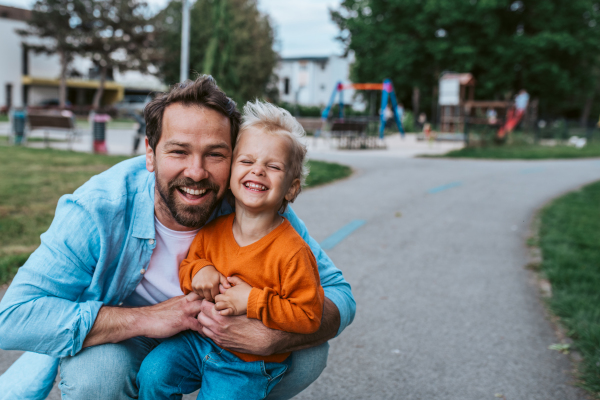Portrait of dad and child enjoying time together. Fathers day concept.