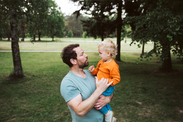 Portrait of dad and child enjoying time together. Fathers day concept.