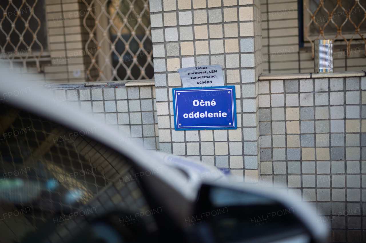 Sign for ophthalmology department on exterior hospital wall