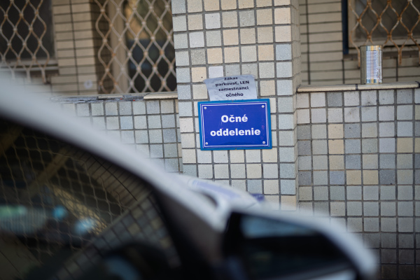Sign for ophthalmology department on exterior hospital wall