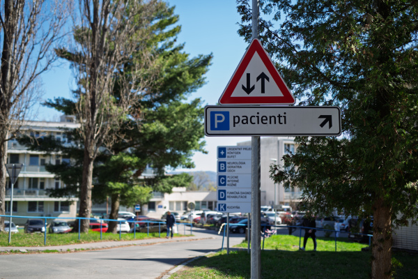 Navigational signage in front of public hospital buildings