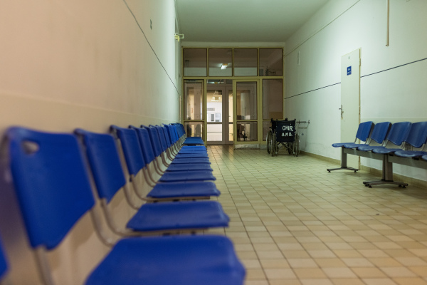 Waiting area in old municipal hospital, in front of doctor's offce.