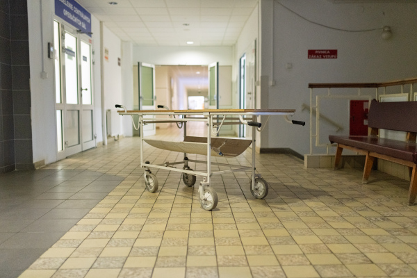 Worn emergency stretcher in old Slovak hospital.