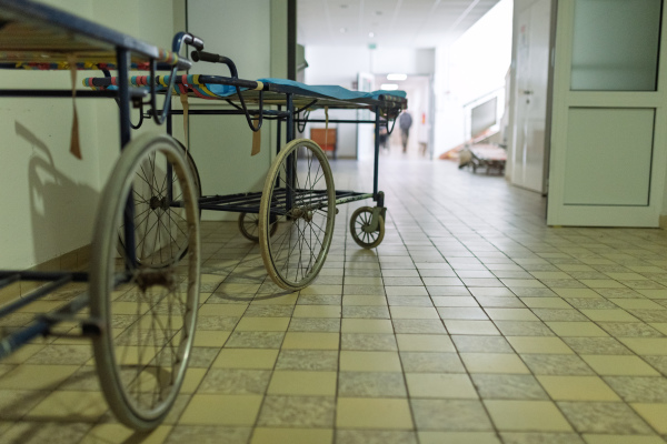 Worn emergency stretcher in old Slovak hospital.