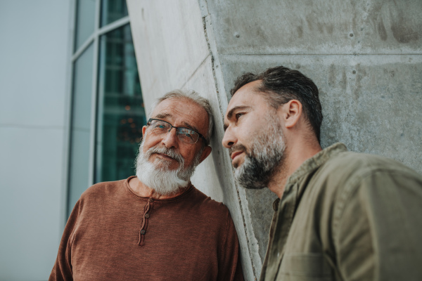 Portrait of handsome mature man and his older father Fathers day concept.