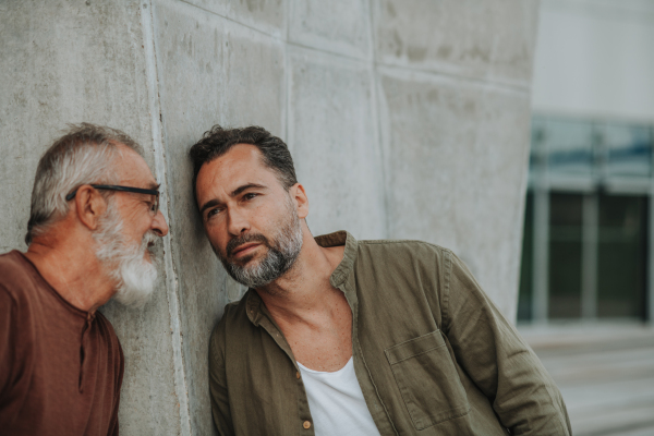 Portrait of handsome mature man and his older father Fathers day concept.