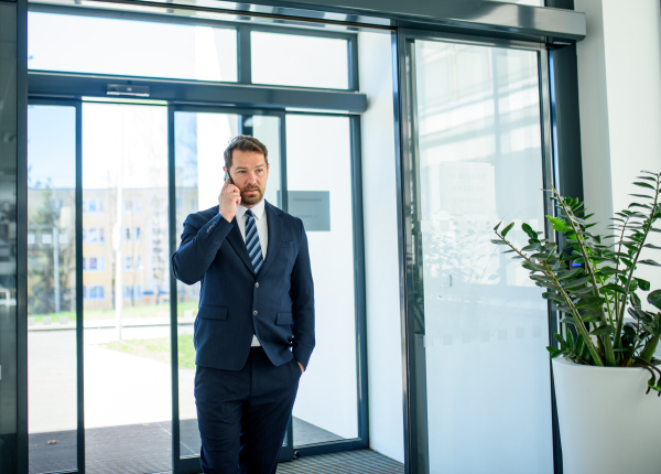 Business professional making phone call, sales representative.