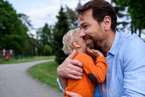 Portrait of dad and child enjoying time together. Fathers day concept.