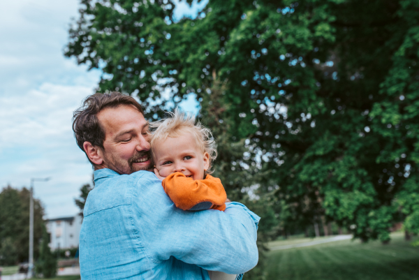 Portrait of dad and child enjoying time together. Fathers day concept.