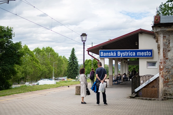 Passengers are waiting for the train at the railway station.