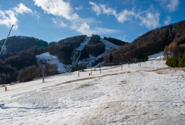 Empty ski lift in mild winter.