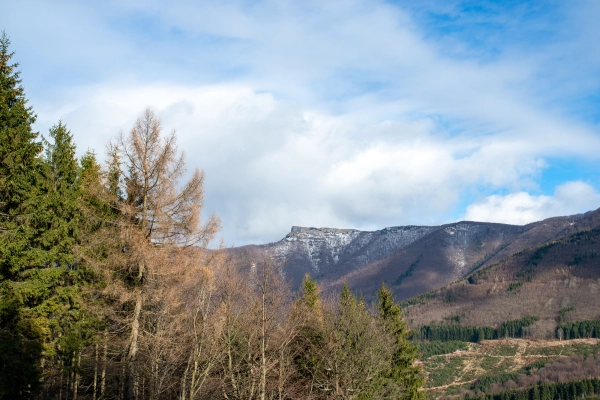 Autumn season in slovak nature with first snow on hilltops.