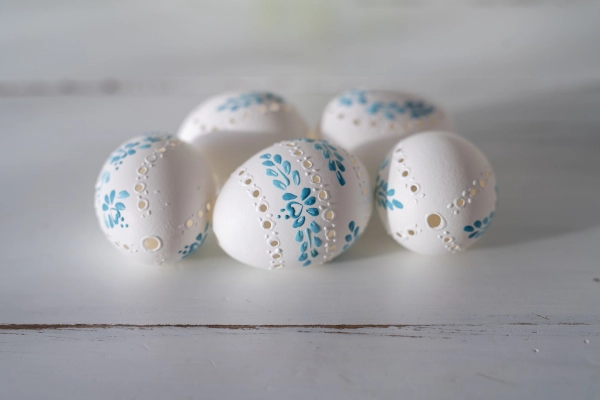 Traditional Slovak easter eggs with blue decorations.